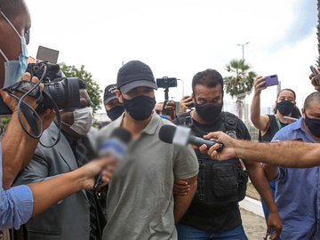 João Paulo de Carvalho Rodrigues sendo preso